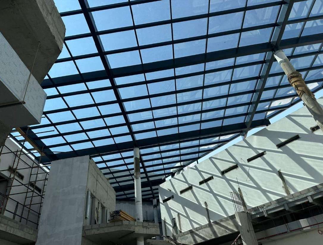 Skylight glass installation at the NCSI building, Muscat